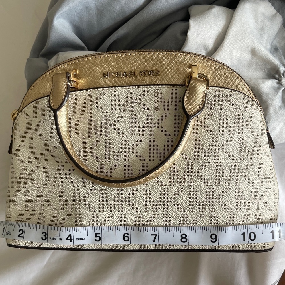 Nwt Michael Kors Emmy white and gold
crossbody - Picture 9 of 12